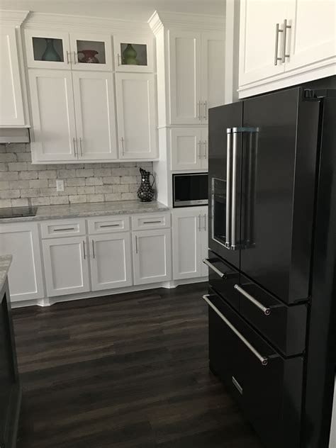 white kitchen cabinets with black stainless steel appliances|black stainless steel kitchen cabinets.